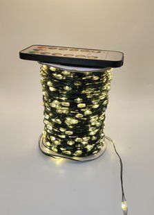 Гірлянда роса 100м 1000LED водостійка (IP44) з пультом управління тепле біле світло, зелена основа, 8 режимів 130106 фото