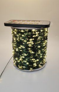 Гірлянда роса 200м 2000LED водостійка (IP44) з пультом управління тепле біле світло, зелена основа, 8 режимів 130107 фото